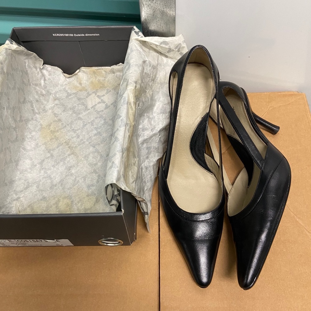 Black leather pumps